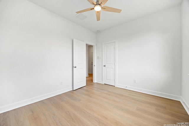 25 Main, Hempstead, TX 77445 - unfurnished room with ceiling fan, visible vents, baseboards, and light wood-style flooring
