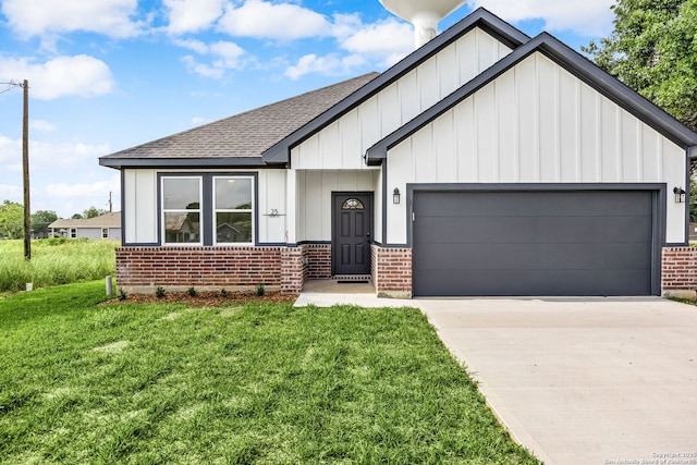 25 Main, Hempstead, TX 77445 - modern inspired farmhouse featuring a shingled roof, board and batten siding, an attached garage, and brick siding