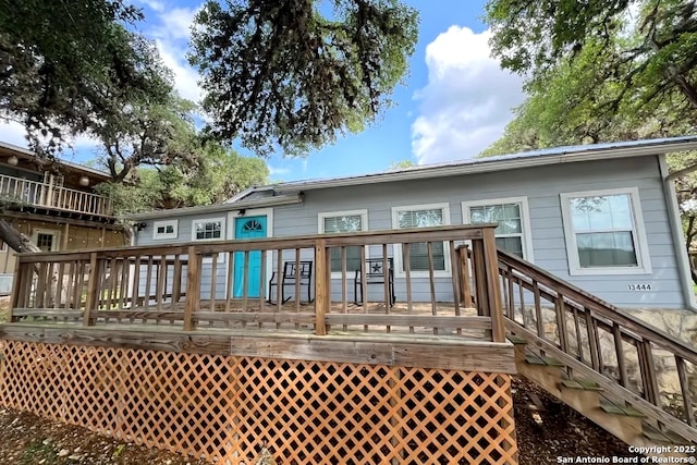 rear view of house with a deck
