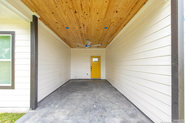 doorway to property with a ceiling fan