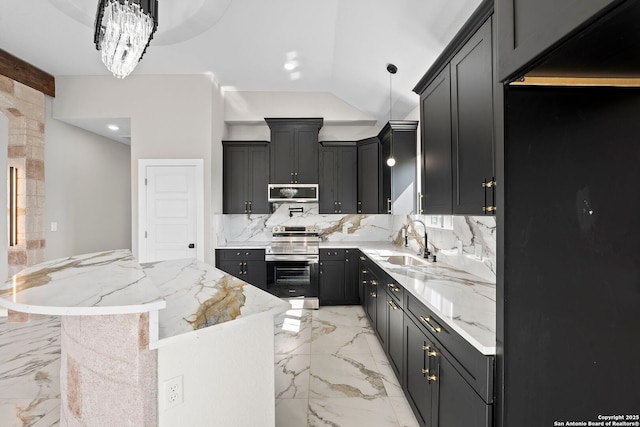 kitchen with decorative backsplash, a kitchen island, appliances with stainless steel finishes, a sink, and marble finish floor