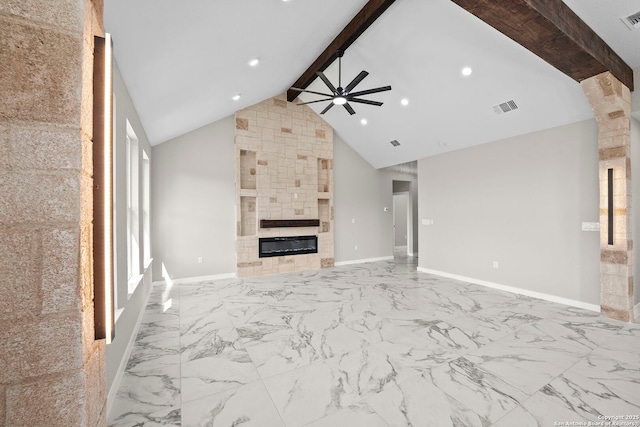 unfurnished living room featuring a ceiling fan, visible vents, a fireplace, beam ceiling, and marble finish floor