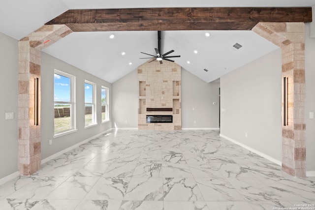 unfurnished living room with visible vents, marble finish floor, a fireplace, baseboards, and ceiling fan