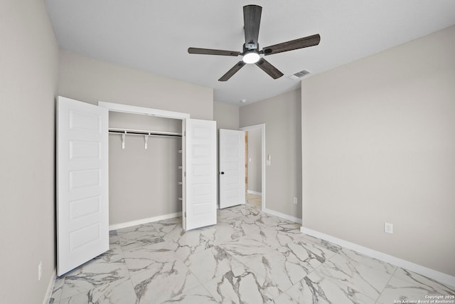 unfurnished bedroom with baseboards, marble finish floor, and visible vents