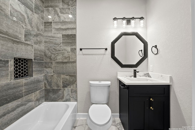 full bath featuring vanity, a textured wall, toilet, and marble finish floor