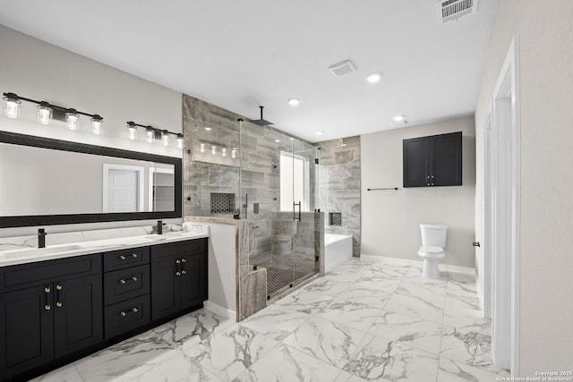 full bathroom with a sink, double vanity, marble finish floor, a shower stall, and visible vents