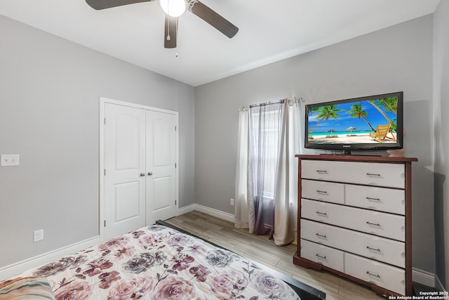 7186 Lake Placid, Corpus Christi, TX 78414 - bedroom with baseboards, ceiling fan, light wood-style flooring, and a closet