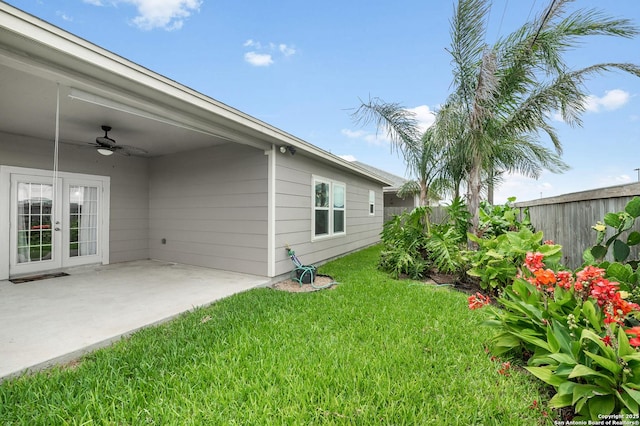 7186 Lake Placid, Corpus Christi, TX 78414 - view of yard with fence, a ceiling fan, a patio area, and french doors