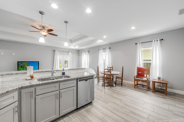 7186 Lake Placid, Corpus Christi, TX 78414 - kitchen featuring stainless steel dishwasher, baseboards, gray cabinetry, and a sink