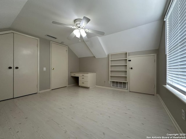 3624 Richwood, San Antonio, TX 78230 - additional living space with visible vents, baseboards, ceiling fan, light wood-type flooring, and vaulted ceiling