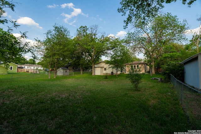 view of yard with fence
