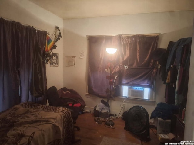 608 Harlan, San Antonio, TX 78214 - bedroom with wood finished floors and cooling unit