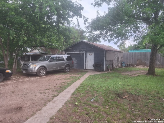 608 Harlan, San Antonio, TX 78214 - view of outbuilding featuring dirt driveway