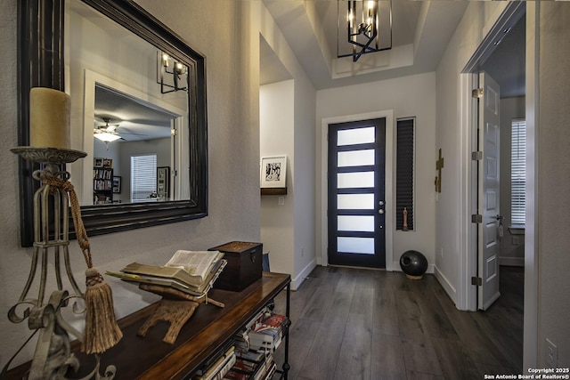 29919 Capstone Walk, Boerne, TX 78015 - foyer with baseboards, a textured wall, ceiling fan with notable chandelier, and dark wood-type flooring