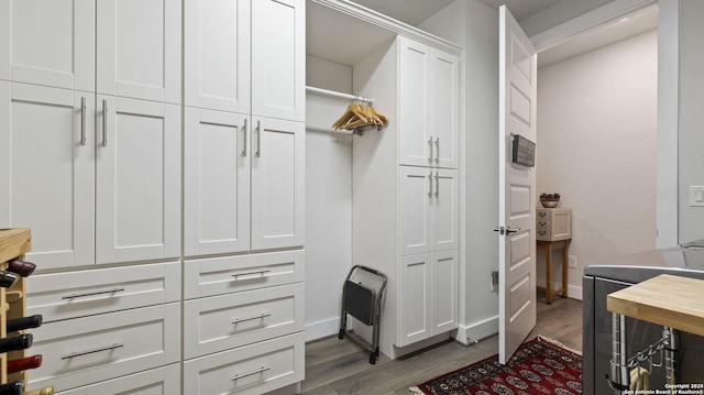 29919 Capstone Walk, Boerne, TX 78015 - mudroom with baseboards and wood finished floors