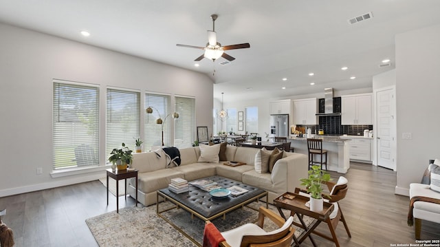 29919 Capstone Walk, Boerne, TX 78015 - living room with recessed lighting, ceiling fan, visible vents, and wood finished floors