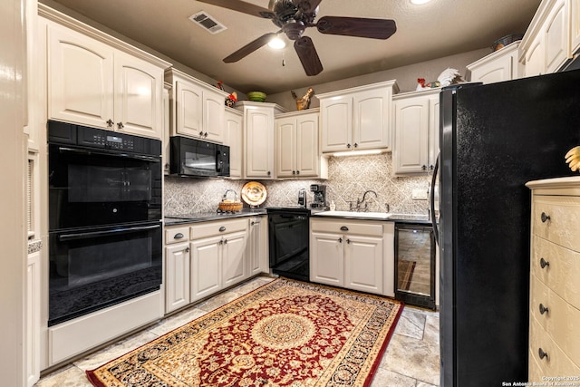 kitchen with ceiling fan, backsplash, visible vents, black appliances, and beverage cooler