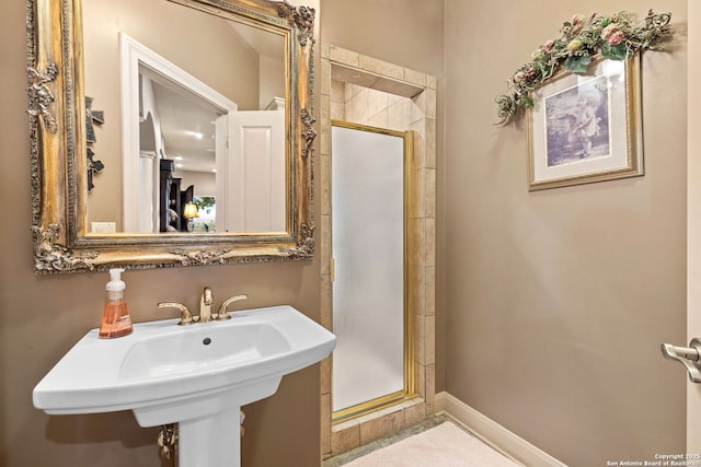 bathroom featuring a stall shower