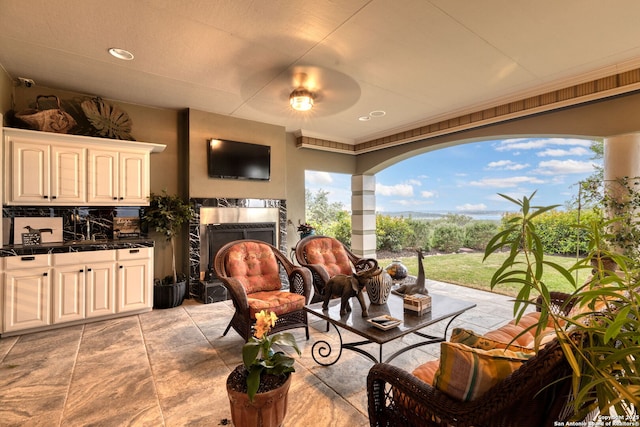 view of patio / terrace with exterior kitchen and an outdoor hangout area