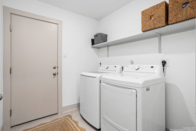 clothes washing area with laundry area and washing machine and dryer