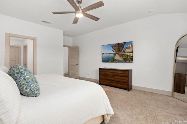 bedroom with baseboards, a ceiling fan, light colored carpet, and visible vents