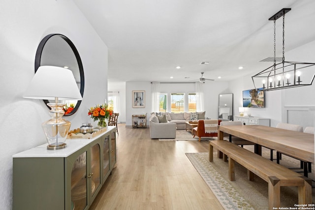 dining area featuring recessed lighting, a ceiling fan, visible vents, and light wood finished floors