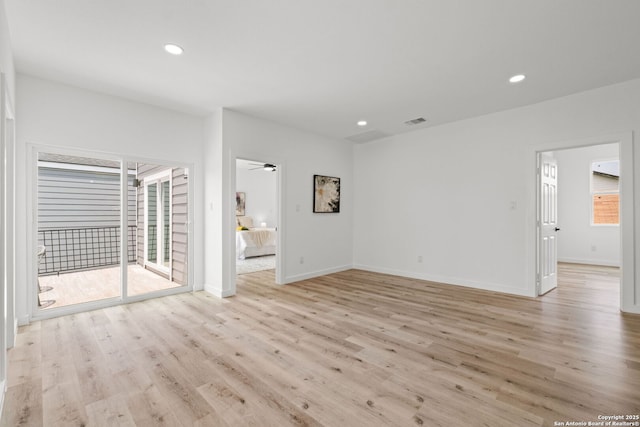 unfurnished living room with recessed lighting, light wood-style flooring, and visible vents