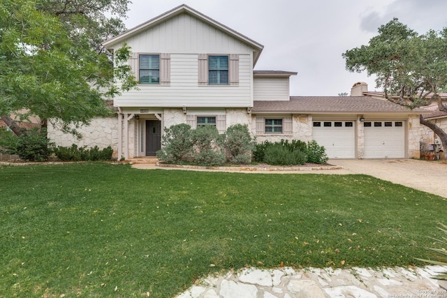2211 Oak Rnch, San Antonio, TX 78259 - tri-level home featuring a chimney, driveway, a front yard, a garage, and stone siding