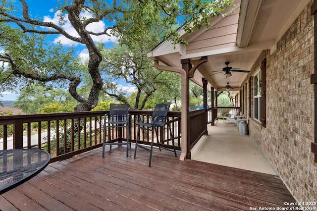 wooden deck with ceiling fan