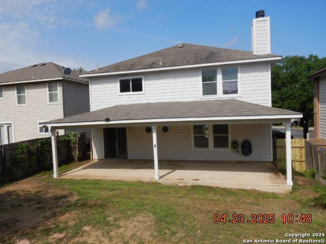 9922 Dull Knife Way, San Antonio, TX 78239 - back of property with a patio area and a chimney