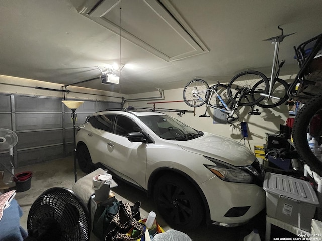 garage featuring a garage door opener