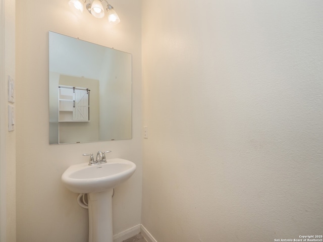 120 Lakeview Ct, Spring Branch, TX 78070 - bathroom with baseboards and a sink