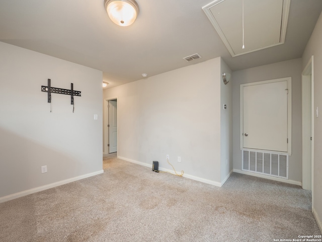 120 Lakeview Ct, Spring Branch, TX 78070 - empty room with attic access, baseboards, carpet flooring, and visible vents