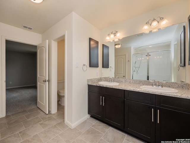 120 Lakeview Ct, Spring Branch, TX 78070 - bathroom with a stall shower, toilet, visible vents, and a sink