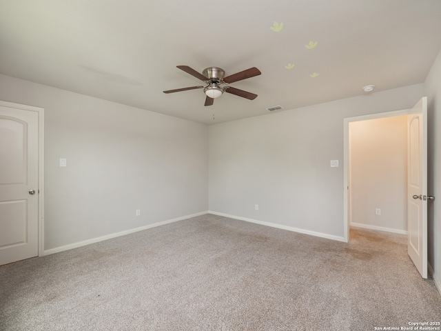 120 Lakeview Ct, Spring Branch, TX 78070 - unfurnished room with light colored carpet, baseboards, a ceiling fan, and visible vents