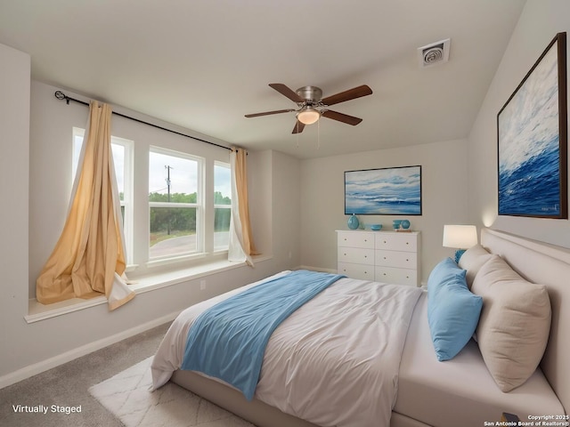 120 Lakeview Ct, Spring Branch, TX 78070 - carpeted bedroom featuring baseboards, a ceiling fan, and visible vents