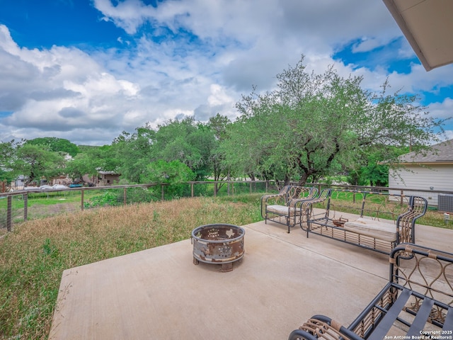 120 Lakeview Ct, Spring Branch, TX 78070 - view of patio / terrace with cooling unit, fence, and a fire pit