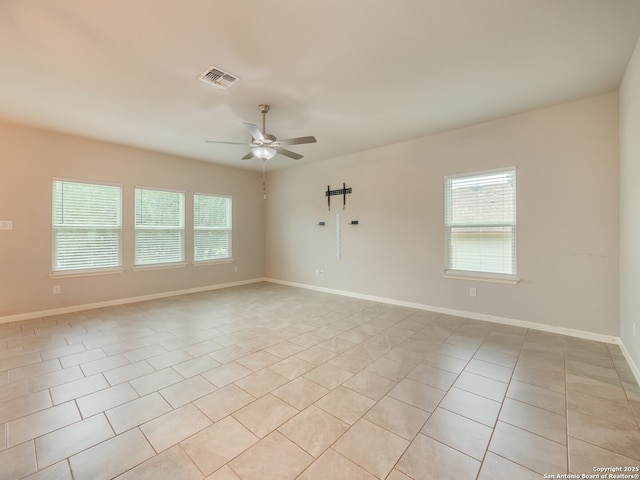 120 Lakeview Ct, Spring Branch, TX 78070 - empty room featuring ceiling fan, baseboards, light tile patterned floors, and visible vents