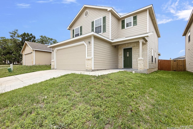 traditional home with stone siding, an attached garage, fence, concrete driveway, and a front yard