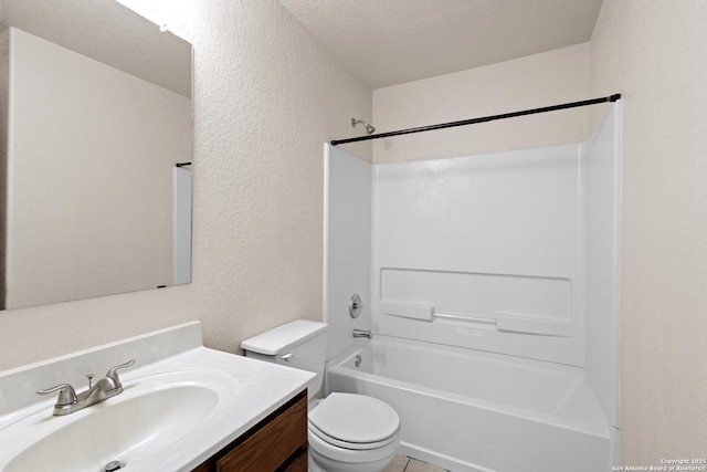full bath with shower / bathtub combination, a textured ceiling, toilet, vanity, and a textured wall