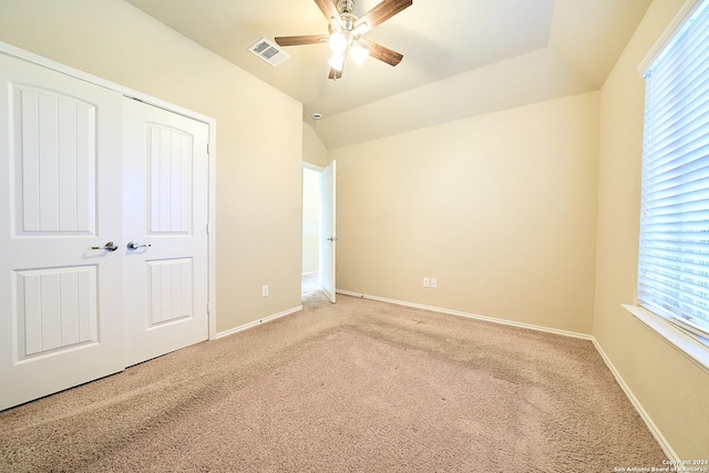 242 Posey Pass, New Braunfels, TX 78132 - unfurnished bedroom featuring visible vents, baseboards, a ceiling fan, and light carpet