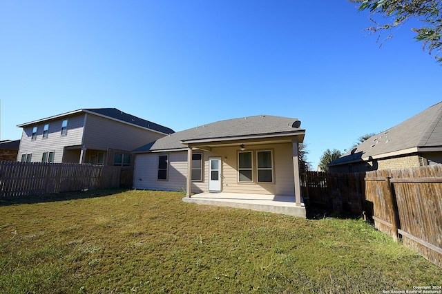 242 Posey Pass, New Braunfels, TX 78132 - rear view of property with ceiling fan, a yard, a fenced backyard, and a patio