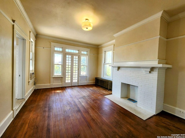 602 W French Pl, San Antonio, TX 78212 - unfurnished living room featuring a brick fireplace, dark wood finished floors, baseboards, ornamental molding, and radiator heating unit