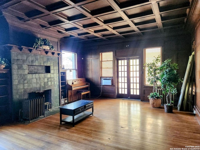 602 W French Pl, San Antonio, TX 78212 - living room featuring radiator, french doors, coffered ceiling, and wood finished floors