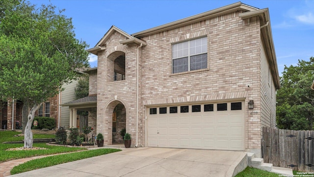 6139 Mackenzie, San Antonio, TX 78247 - traditional-style home featuring driveway, a garage, fence, and brick siding