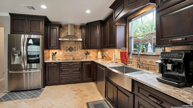 6139 Mackenzie, San Antonio, TX 78247 - kitchen featuring stainless steel appliances, wall chimney exhaust hood, a sink, backsplash, and recessed lighting
