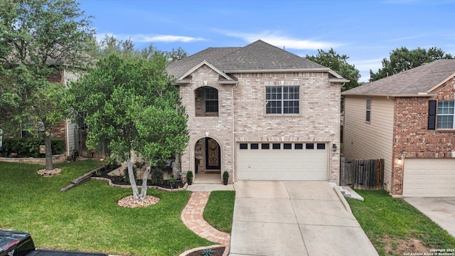 6139 Mackenzie, San Antonio, TX 78247 - view of front of house featuring an attached garage, concrete driveway, brick siding, and a shingled roof