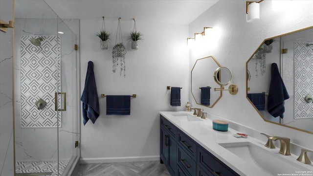 6139 Mackenzie, San Antonio, TX 78247 - bathroom with a stall shower, double vanity, and baseboards