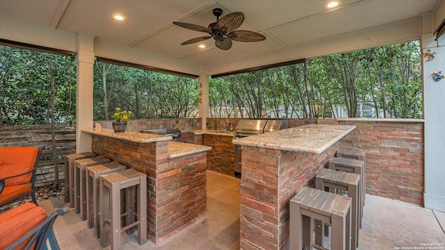 6139 Mackenzie, San Antonio, TX 78247 - view of patio featuring area for grilling and a ceiling fan