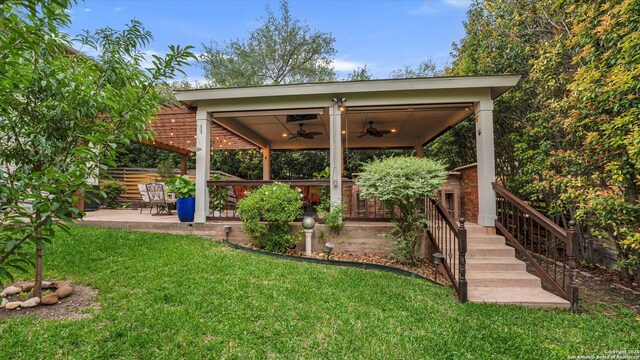 6139 Mackenzie, San Antonio, TX 78247 - view of yard featuring ceiling fan and a patio area